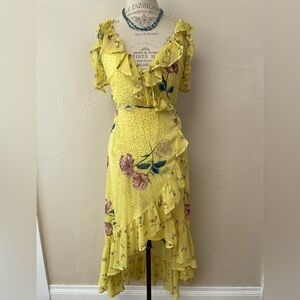 4/$20 Yellow floral wrap dress with asymmetrical hem and drop flounce sleeves